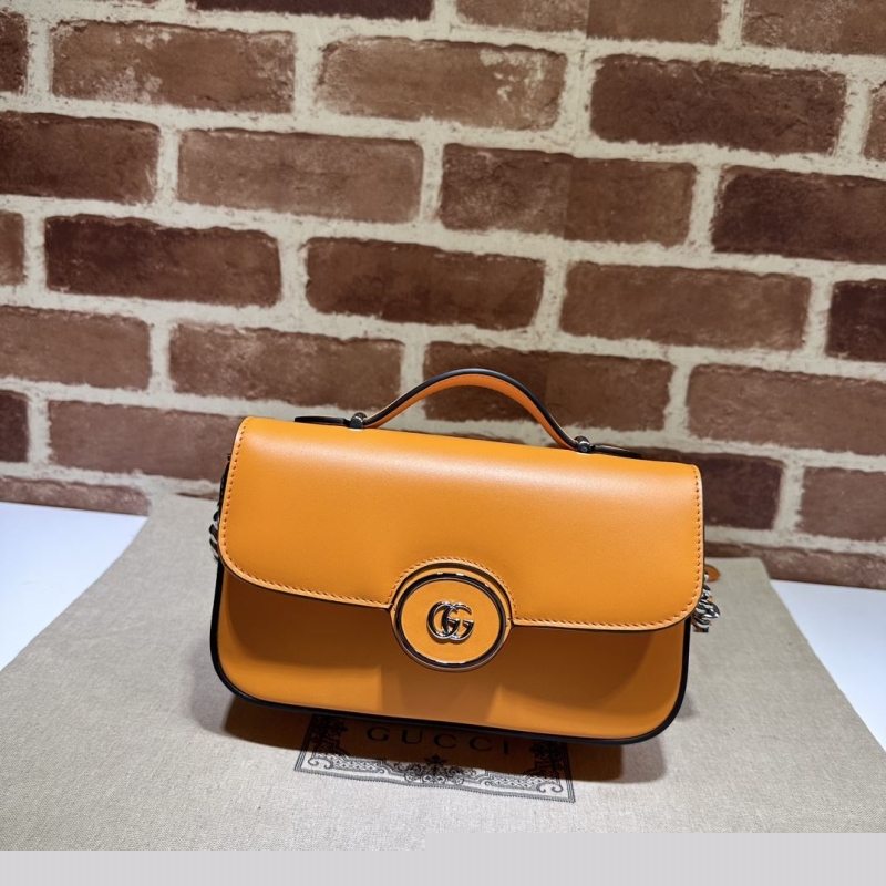 G*u*i top handle bags